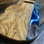 Resin on olivewood handcrafted chopping board with handle
